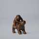 A CARVED WOOD NETSUKE OF A MONKEY ON THE BACK OF A TIGER - Foto 1