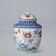 A PORCELAIN JAR AND COVER - photo 1