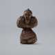 A CARVED WOOD NETSUKE OF A BUGAKU DANCER OF KING LANLING (RANRYO-O) - photo 1