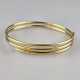 18K-Goldarmreif in Form einer Spirale - Gelbgold 7… - фото 1