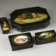 A COLLECTION OF FOUR PAPIER-MACHÉ AND LACQUER BOXES DEPICTING TROIKA, AN IMAGE OF A YOUNG - photo 1