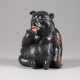 AN OBSIDIAN CARVING OF A SITTING BEAR - photo 1