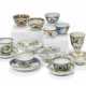 A GROUP OF K&#220;TAHYA POTTERY CUPS, SAUCERS AND CANDLE HOLDERS - photo 1