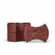 A RARE CARVED CINNABAR LACQUER INGOT-FORM FOUR-TIERED BOX AND COVER - photo 1