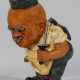 Humoristische Figur eines Mannes mit Messer und Beil - photo 1
