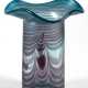 Vase, Eisch, signiert, blaugraues Glas z.T. irisierend, mit lila Einschmelzungen, geschweifter, breiter Rand, H. 21,5 cm - photo 1