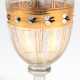 Biedermeier-Glas, Kuppa umlaufend mit Golddekor und Emailmalerei, Goldränder berieben, Scheibenfuß mit ausgeschliffenem Abriß, H. 11,5 cm - photo 1