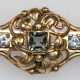 Turmalin-Brillant-Brosche, 750er GG, ausgefasst mit 1 Turmalin im Carreeschliff von ca. 0,80 ct. und 4 Brillanten von zus. ca. 0,45 ct., Si, Broschierung mit Patentsicherung, Ges.-Gew. 16,40 g, L. 8,2 cm (Wiederbeschaffu… - photo 1