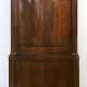 Biedermeier-Eckschrank, Mahagoni furniert, viertelrund, 2-türiges Unterteil mit 1 Schubkasten, 2-türiger Aufsatz, gerades Profilgesims, leichte Gebrauchspuren, 217x122x73 cm - photo 1