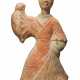 A LARGE CHINESE PAINTED POTTERY FIGURE OF A FEMALE DANCER - photo 1