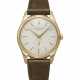 PATEK PHILIPPE. A VERY RARE AND ELEGANT 18K GOLD AUTOMATIC WRISTWATCH WITH CREAM-COLORED ENAMEL DIAL - Foto 1