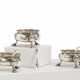 SERIES OF THREE SILVER GEORGE II SALT SHAKERS - photo 1
