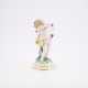 LARGE PORCELAIN FIGURINE OF CUPID WITH BASKET - photo 1