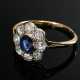 Antiker Gelbgold 750 und Platin Entourage Ring mit Saphir (ca. 0.50ct) in ovaler Altschliffdiamant Lunette (zus. ca. 0.64ct/P1/TCR), England um 1910, 2,1g, Gr. 55, 1 Diamant angeschlagen - photo 1