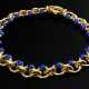 Modernes Gelbgold 750 Collier mit hohl gearbeiteten Ringgliedern und seitlich eingefügten Lapislazuli Kugeln an Ringschließe, 89g, L. 42cm - Foto 1