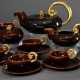 15 Teile französisches Midcentury Teeservice "Volutes", Vallauris, Entw.: Louis Giraud, heller Scherben braun glasiert und partiell vergoldet, Boden gemarkt, bestehend aus: Kanne (H. 15cm, best.), 12 Tassen/UT … - photo 1