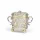 A CHARLES II PARCEL-GILT SILVER TWO-HANDLED PORRINGER AND COVER - photo 1