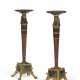 A PAIR OF EGYPTIAN REVIVAL MAHOGANY, PARCEL-EBONIZED, AND PARCEL-GILT TORCHERES - photo 1