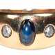 Ring, 750er GG, sich verbreiternde massive Schiene besetzt mit 1 ovalem Saphir-Cabochon und 2 Brillanten von zus. ca. 0,20 ct., Juwelier Wilm, Ges.-Gew. ca. 8,7 g - фото 1