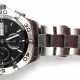 Herrenarmbanduhr "Tag Heuer", Aquaracer 300 m, Automatic, Chronograph, schwarzes Zifferblatt mit Stabindizes, Wochentag- und Datumsanzeige, Dm. 4,4 cm, funktionstüchtig (überprüft), Edelstahlarmband mit Faltsch… - photo 1