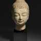 A SMALL LIMESTONE HEAD OF BUDDHA - photo 1