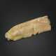 A MOTTLED RUSSET-BEIGE JADE CARVING OF A PIG - photo 1