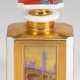 KPM-Teedose, 20. Jh., Schauseite "Ansicht von London 1930", rückseitig "Londoner Stadtwappen", allseitig goldfarben gefasst, auf Deckel Union Jack auf rotem Grund, Korpus mit eingezogenen Kanten, auf … - photo 1