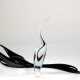 2 Murano-Vogelfiguren, dabei Reiher, Klarglas mit weinroten und hellblauen Einschmelzungen H. 29 cm und Ente, mit schwarz-weißem Korpus (kopflastig), H. 10 cm, L. 40 cm - фото 1