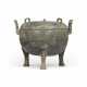 AN ARCHAIC BRONZE TRIPOD RITUAL FOOD VESSEL AND COVER, DING - photo 1 AN ARCHAIC BRONZE TRIPOD RITUAL FOOD VESSEL AND COVER, DING - photo 1