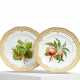 TWO DECORATIVELY PIERCED PORCELAIN DESSERT PLATES WITH FRUIT AND NUTS - фото 1 TWO DECORATIVELY PIERCED PORCELAIN DESSERT PLATES WITH FRUIT AND NUTS - фото 1