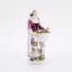 PORCELAIN FIGURINE OF A GARDENER WITH BASKET - фото 1