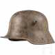 Stahlhelm M 16, mit Resten des Tarnanstriches - photo 1