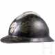 An Adrian helmet M 22 reused by the French gendarmerie - photo 1