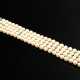 Four-row cultured pearl bracelet with simple white… - photo 1
