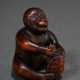 Boxwood netsuke ‘Monkey with turtle’, dark stained… - photo 1 Boxwood netsuke ‘Monkey with turtle’, dark stained… - photo 1
