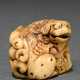 Hirschhorn Netsuke "Shishi auf Felsen" mit grimmig… - Foto 1