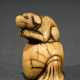 Mingei Hirschhorn netsuke ‘Puppy on Hotei's sack’,… - photo 1 Mingei Hirschhorn netsuke ‘Puppy on Hotei's sack’,… - photo 1