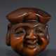 Boxwood netsuke ‘Ebisu mask’, signed Deme kore sak… - photo 1