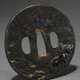 Round oval iron tsuba with shibuichi, gold and cop… - photo 1