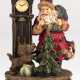 Spieluhr "Weihnachtsmann mit Standuhr und Hund", Gußmasse farbig gefasst, Melodie "OhTannebaum", funktionstüchtig, H. 22 cm, Dm. 11 cm - photo 1 Spieluhr "Weihnachtsmann mit Standuhr und Hund", Gußmasse farbig gefasst, Melodie "OhTannebaum", funktionstüchtig, H. 22 cm, Dm. 11 cm - photo 1