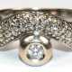 Brillant-Ring, 585er WG, besetzt mit 1 Brillanten von ca. 0,20 ct. und ca. 35 kl. Diamanten, Ges.-Gew. 8,65 g, RG 57 - photo 1 Brillant-Ring, 585er WG, besetzt mit 1 Brillanten von ca. 0,20 ct. und ca. 35 kl. Diamanten, Ges.-Gew. 8,65 g, RG 57 - photo 1