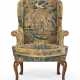 A GEORGE I WALNUT AND NEEDLEWORK WING ARMCHAIR - Foto 1