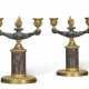 A PAIR OF SWEDISH ORMOLU, PATINATED BRONZE AND PORPHYRY ('LOKA RISBERGS') TWO-LIGHT CANDELABRA - фото 1