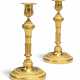 A PAIR OF LOUIS XVI ORMOLU CANDLESTICKS - photo 1