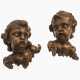 A pair of winged putti heads - фото 1