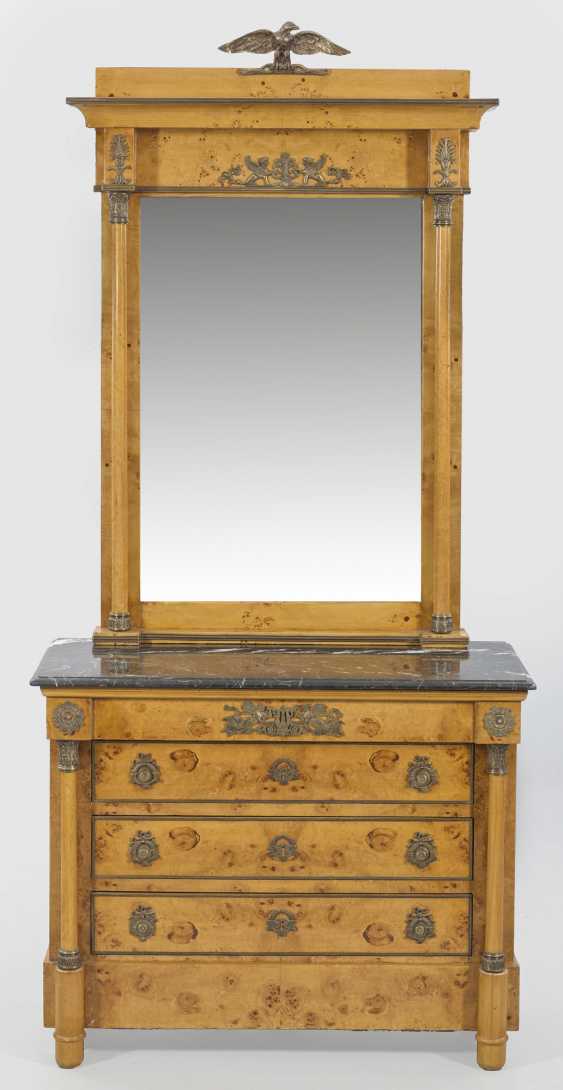 Chest Of Drawers With A Large Wall Mirror In The Empire Style