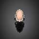 Anello in oro bianco con corallo rosa ovale di mm 20.50x11.50 circa e diamanti rotondi per complessivi ct. 1 - photo 1