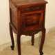 A French Provencal small chest on four high shaped legs with scroll endings - photo 1