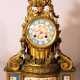 A French chimney clock on rectangular base with bowed front, central column with two volutes and a laurel band - фото 1
