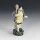 Fayence-Figur: Mann mit Waffeleisen auf grünem Rundsockel - Foto 1